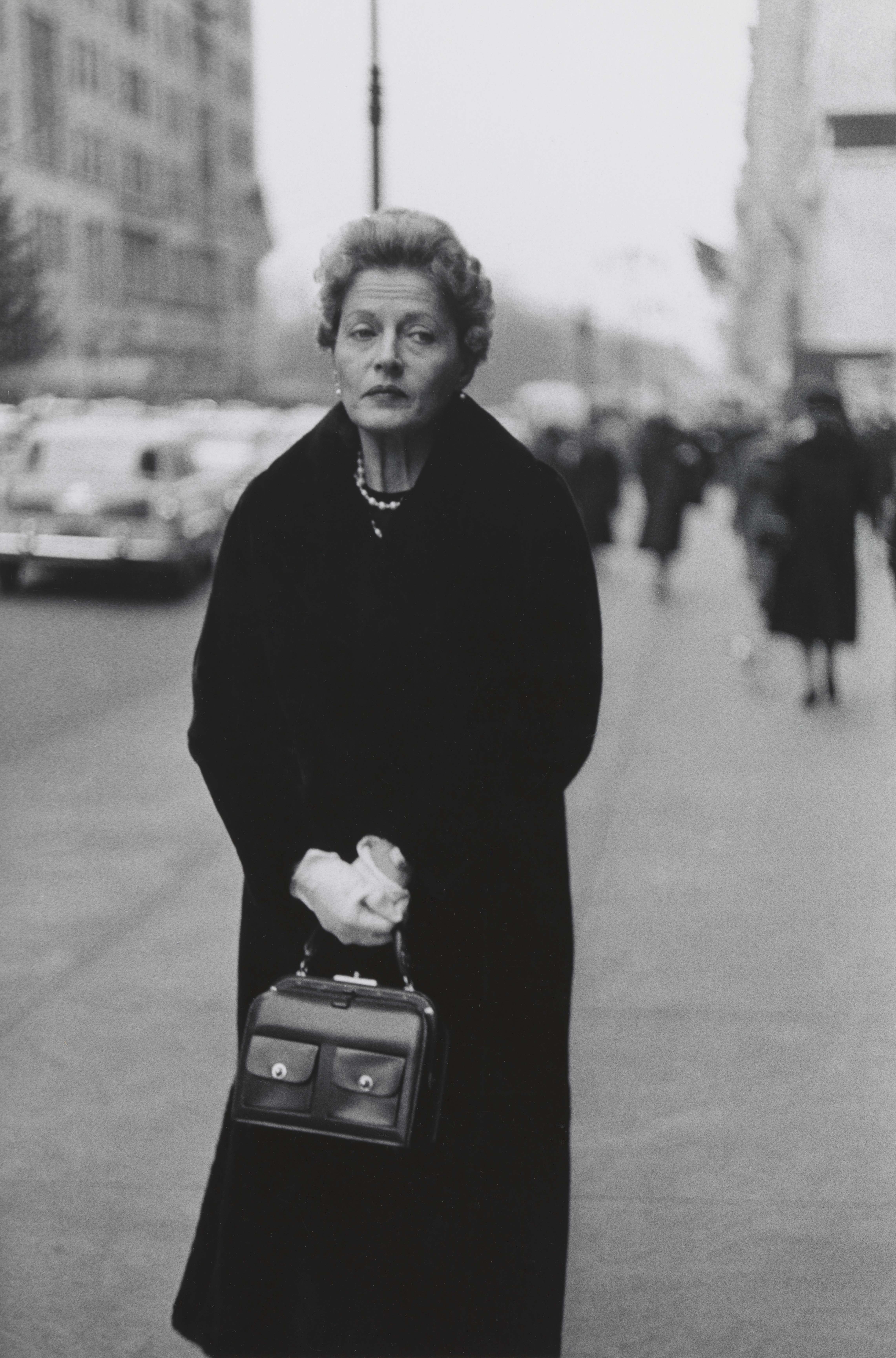 Diane Arbus. Woman with white gloves and a pocket book, NYC 1956. Gelatin silver print. 10 × 6½ in. © The estate of Diane Arbus, LLC. All rights reserved.
