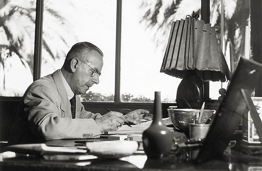 Thomas Mann at work in his home in Pacific Palisades. c. 1947.
